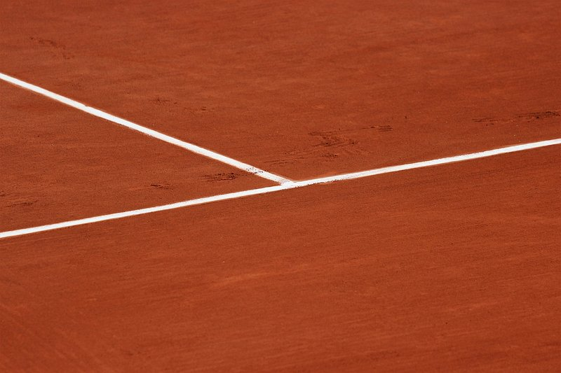 Red clay tennis court lines